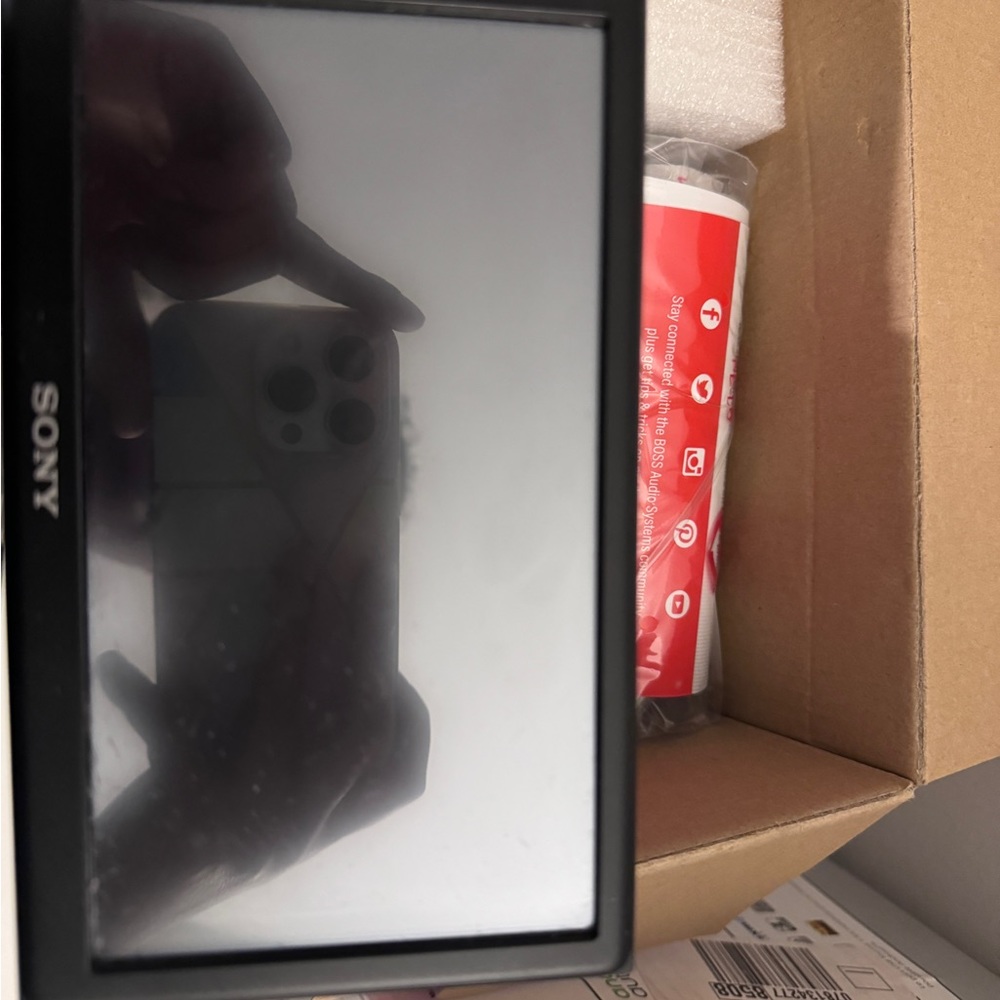 Fits most cars; SONY touch radio in box with wires